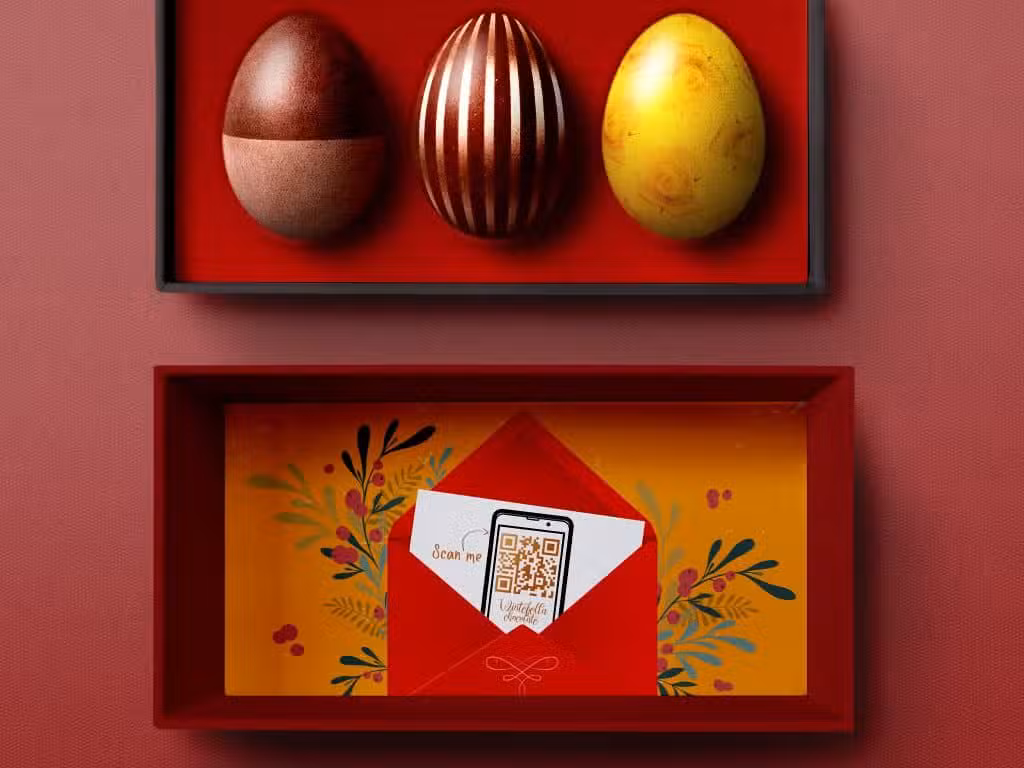 a qr code on product packaging in a red box with an envelope for chocolate Easter eggs
