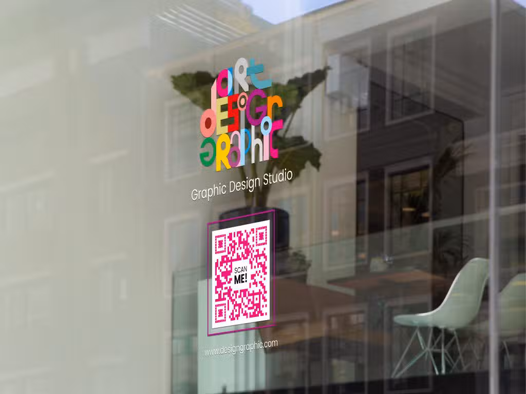 a pink QR code on Graphic Design Studio window