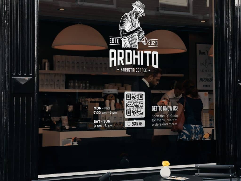 a qr code on a window of a coffee shop