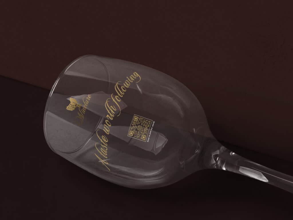 wine glass with a qr code and gold writing