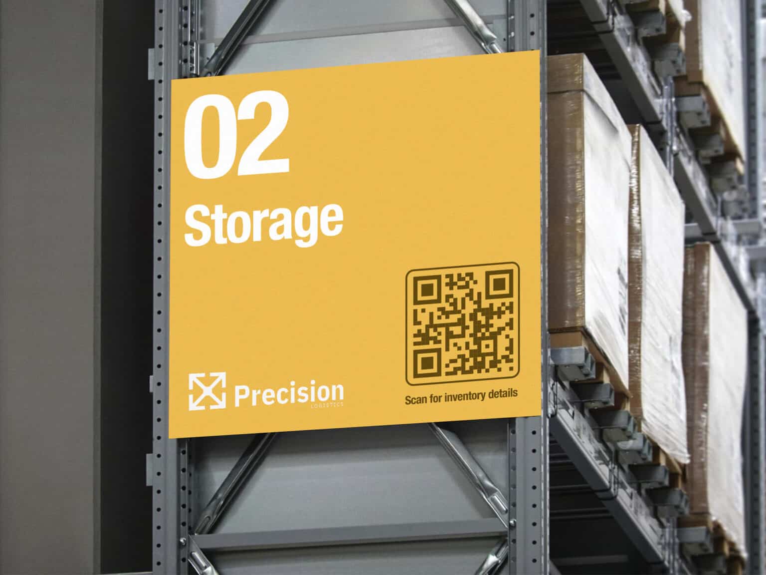 A yellow sign with a QR code on the side of a pallet rack.