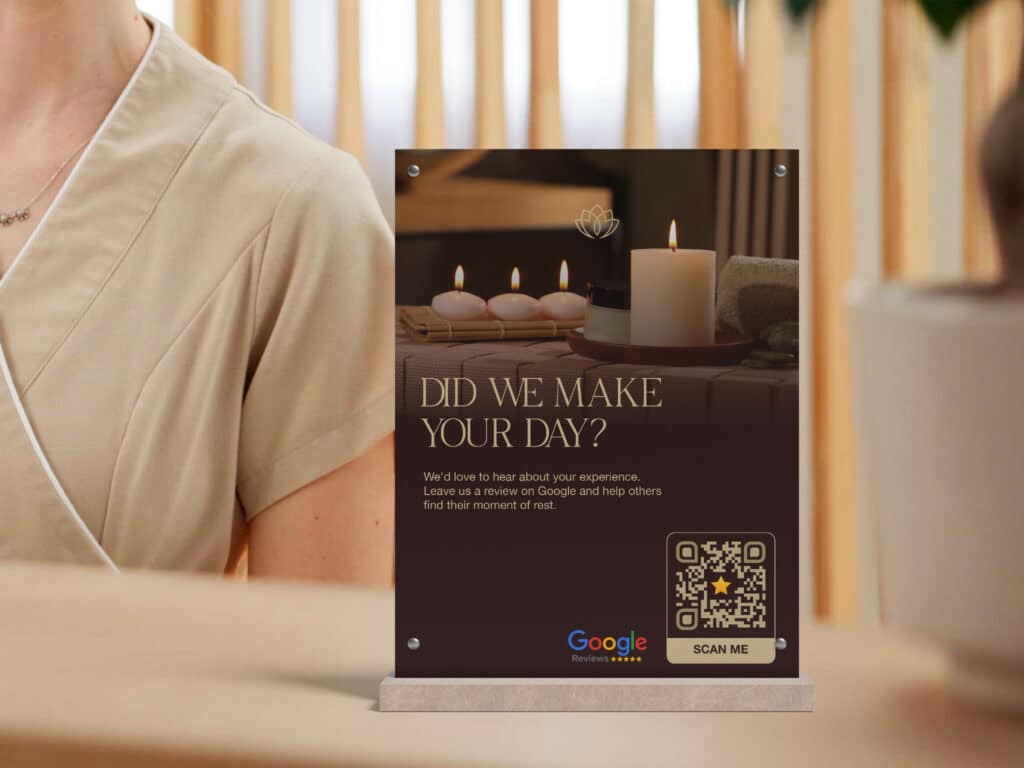 QR code for reviews on a table tent at a day spa