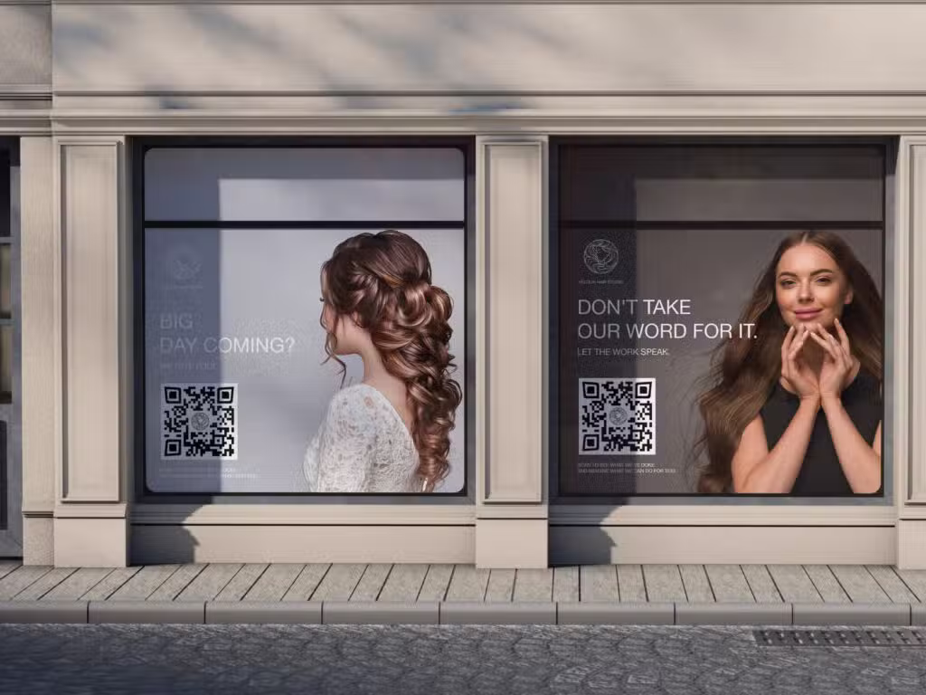 2 displays with women with hair done for salon advert with qr codes on them